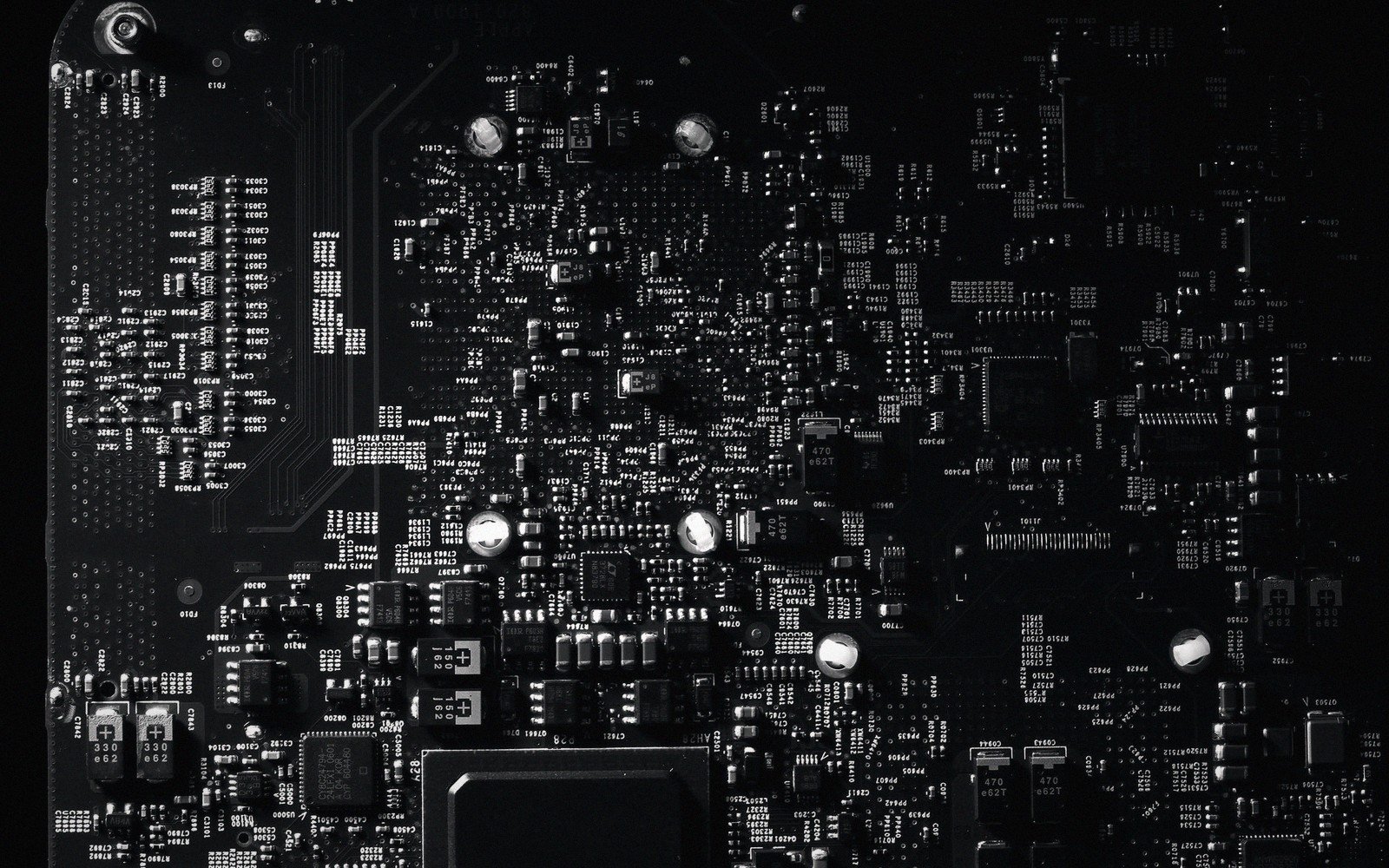 a bare printed circuit board in raking light, macro